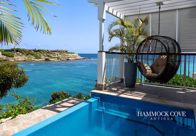 hammock cove antigua infinity pool balcony with beach and sea view
