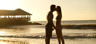 StJamesClubMorganBay_CouplesFamilies_Couple-on-Beach-Menu
